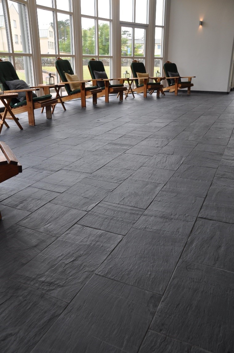 Slate flooring offering the ultimate design in this relaxing room